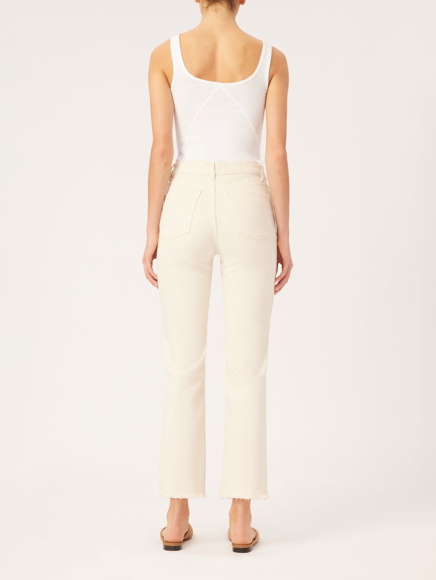 Patti Straight cream-colored women's pants styled with casual white tank and sandals