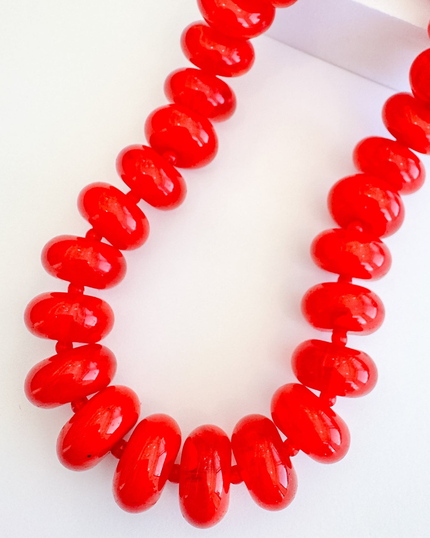 Sugar Beads necklace with vibrant red gemstone-inspired beads, personally curated Fredericksburg TX