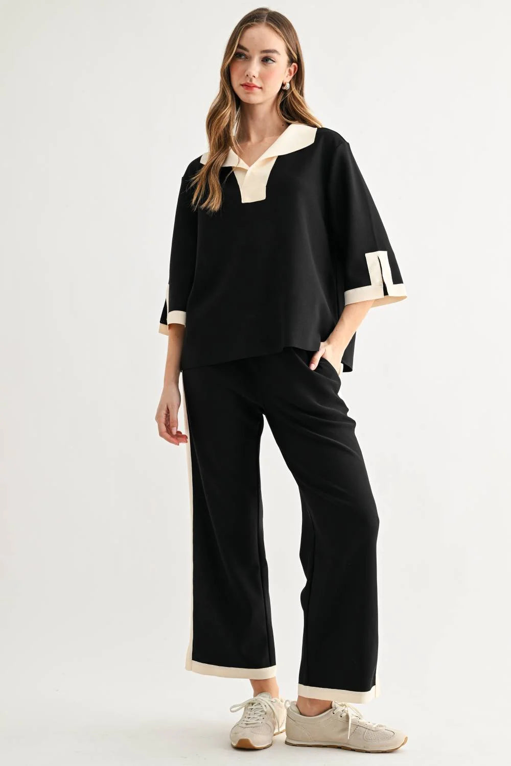 Katherine Top - Black by JOH APPAREL, relaxed black top with cream collar and cuffs