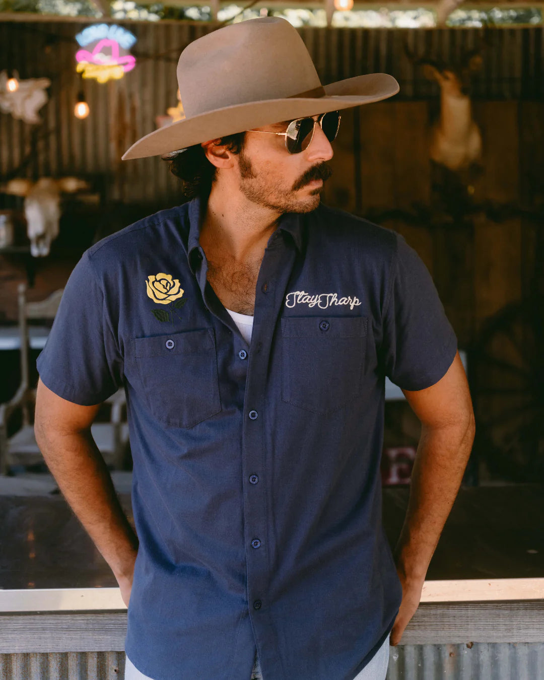 Drifter Shirt - Yellow Rose navy short sleeve with yellow rose and "Stay Sharp" embroidery by TEXAS STANDARD