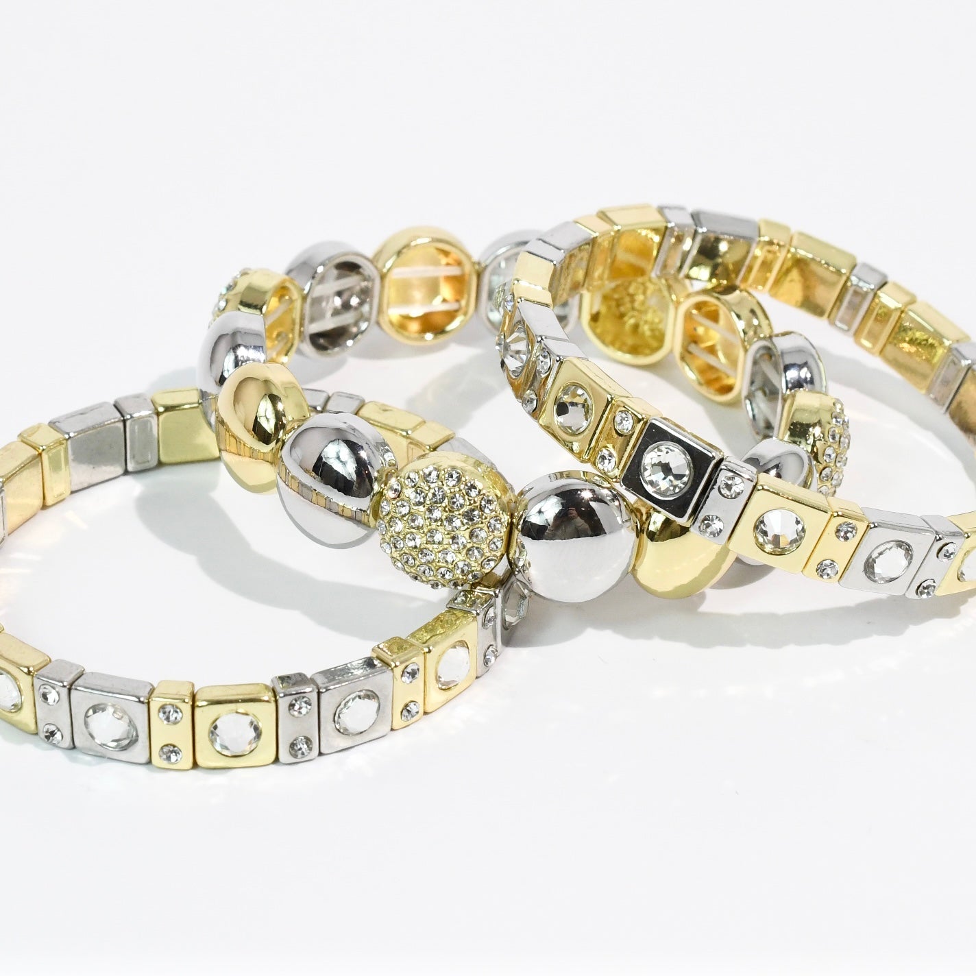 Mix Metal Sparkle Stack Set with geometric gold and silver tones and crystal accents by TREASURE JEWELS