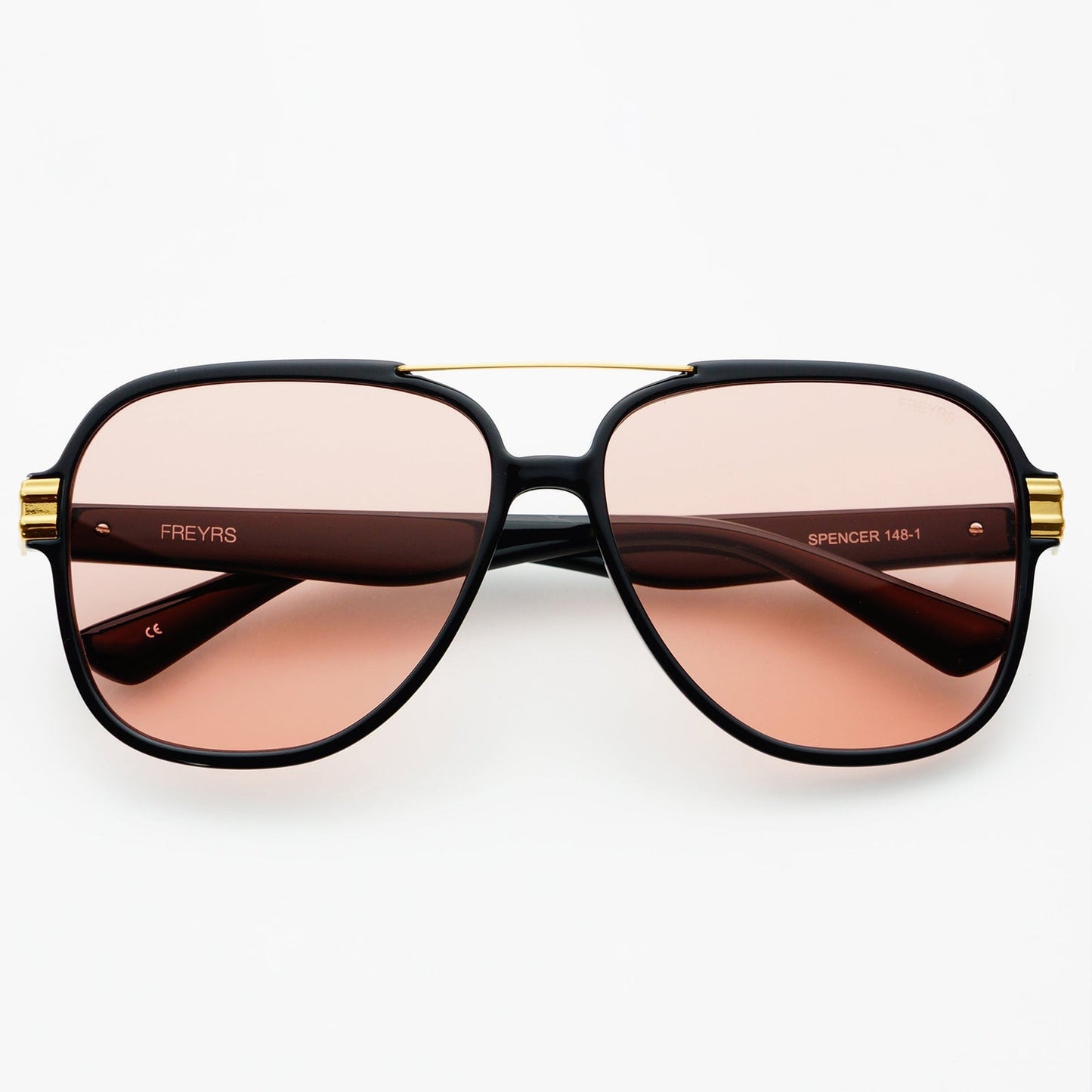 Spencer sunglasses with black and gold frame and rose-tinted lenses, showcasing a sleek, durable design for effortless Hill Country style, curated in Fredericksburg, Texas.