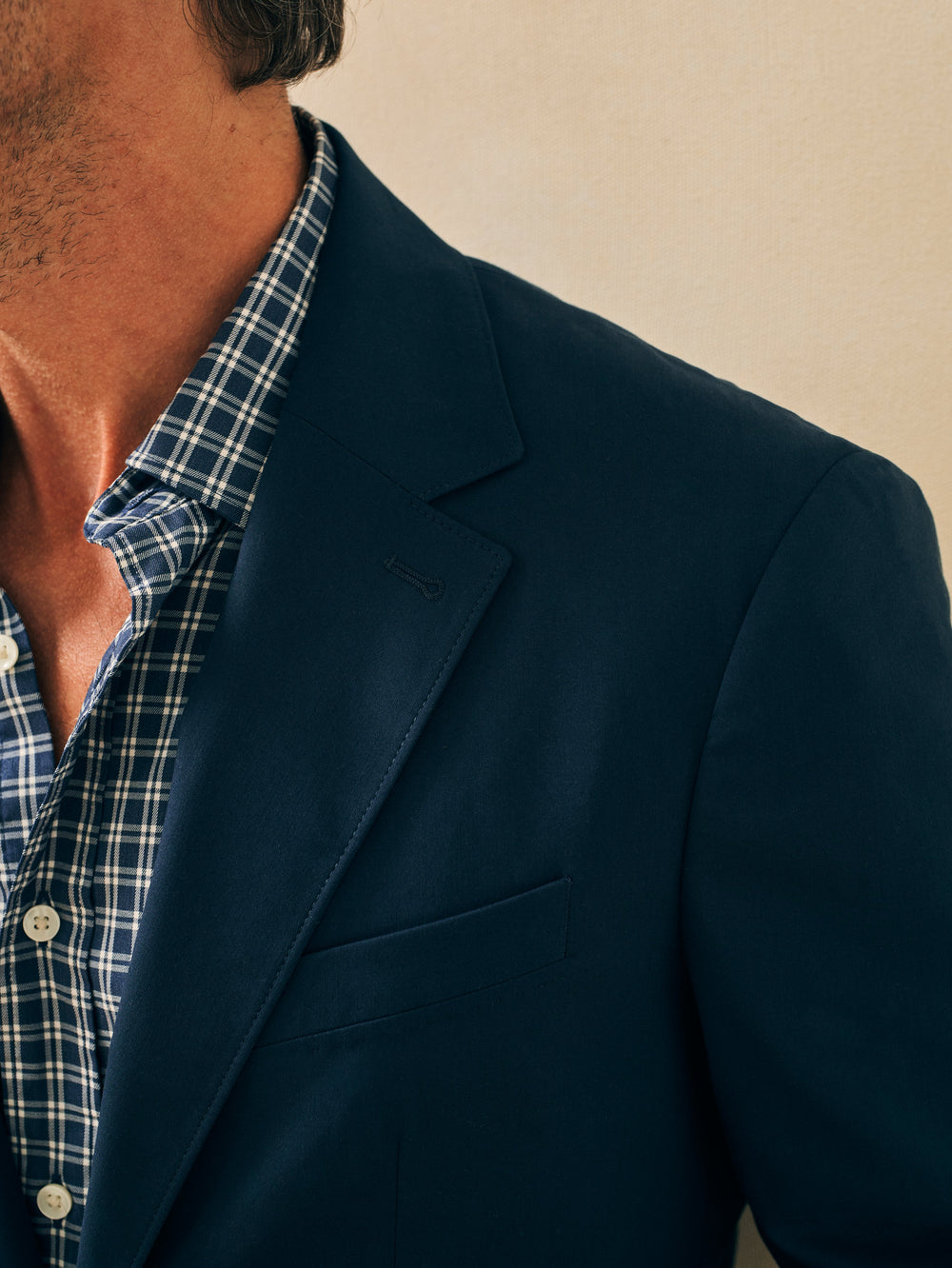 Movement Blazer in rich navy paired with checked shirt, personally curated in Fredericksburg Texas