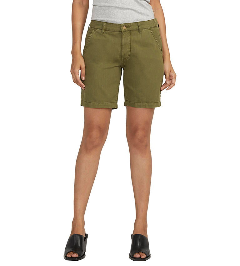 Tailored Short 8" in olive green styled with black mules, curated in Fredericksburg Texas boutique
