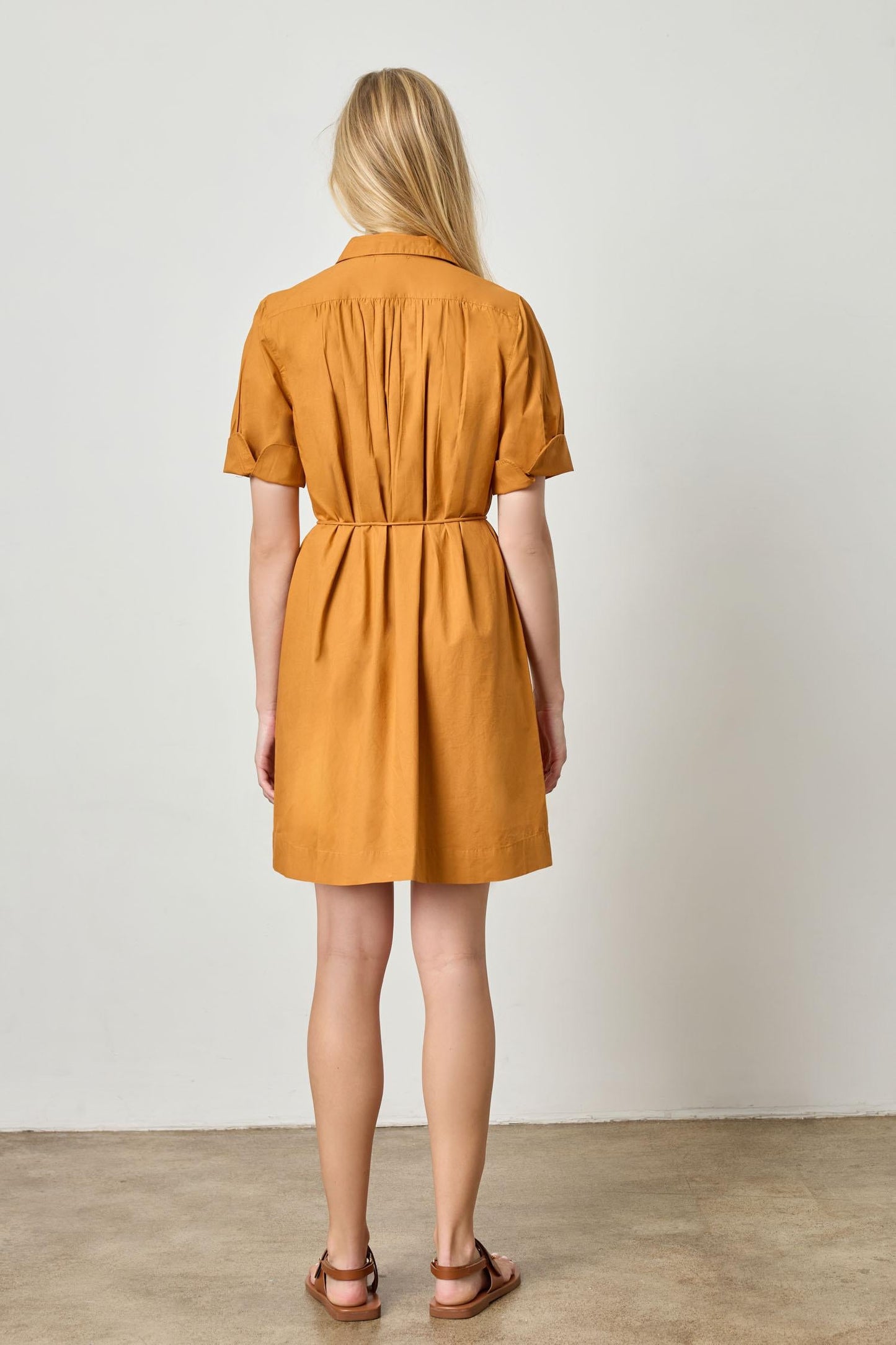 Marmalade shirt dress back view with gathered shoulders and tied waist