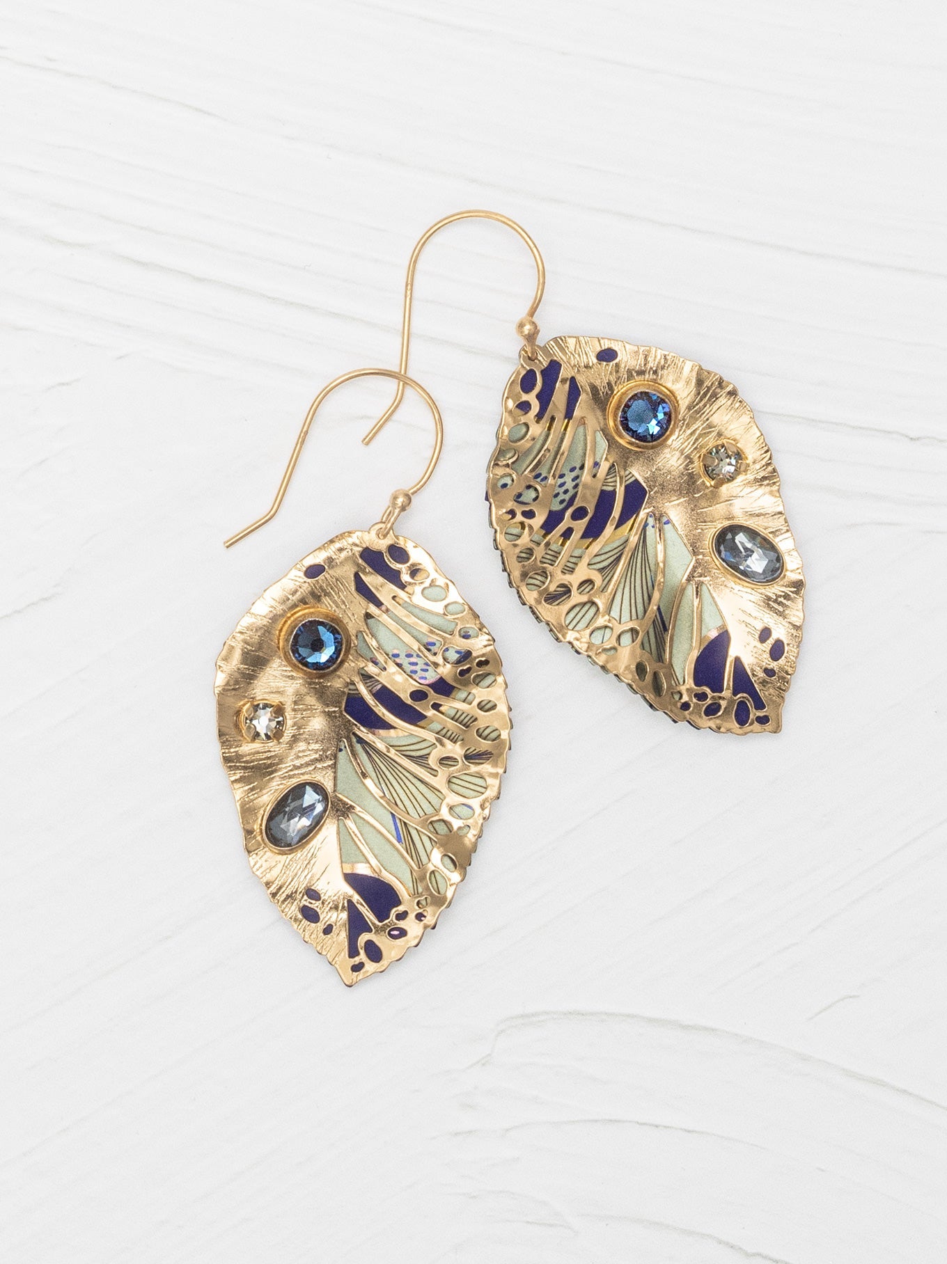Indigo Perennial Elm earrings: gold leaf drop with blue and clear stones