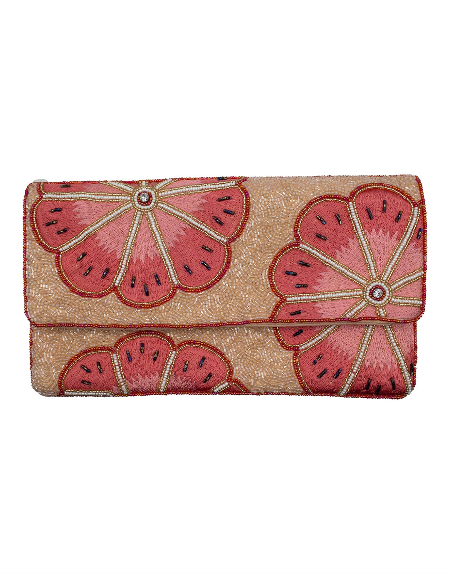 Coral pink beaded clutch with watermelon-style appliqués and rhinestone clasp