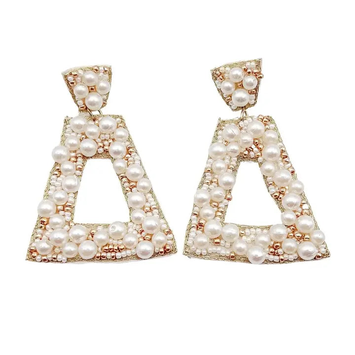 Penelope Pearl earrings: white pearls on gold-tone triangular A hoops