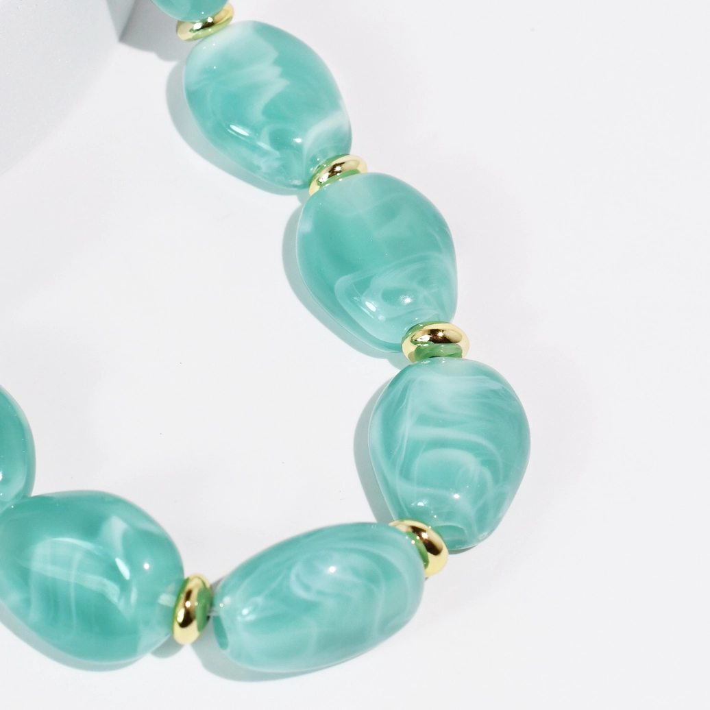 Aqua Muse Necklace with marbled aqua stones and gold accents personally curated in Fredericksburg TX