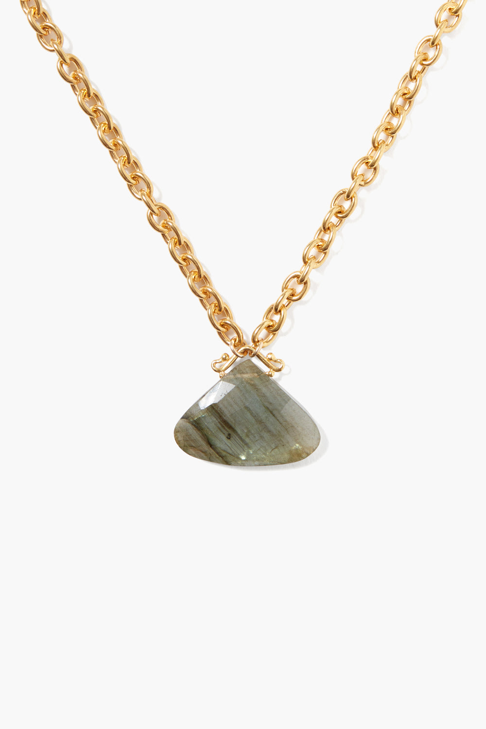 Ngz-15176Lq features a gold-toned chain with a polished triangular labradorite pendant, a high-quality, personally curated piece embodying effortless Hill Country style.