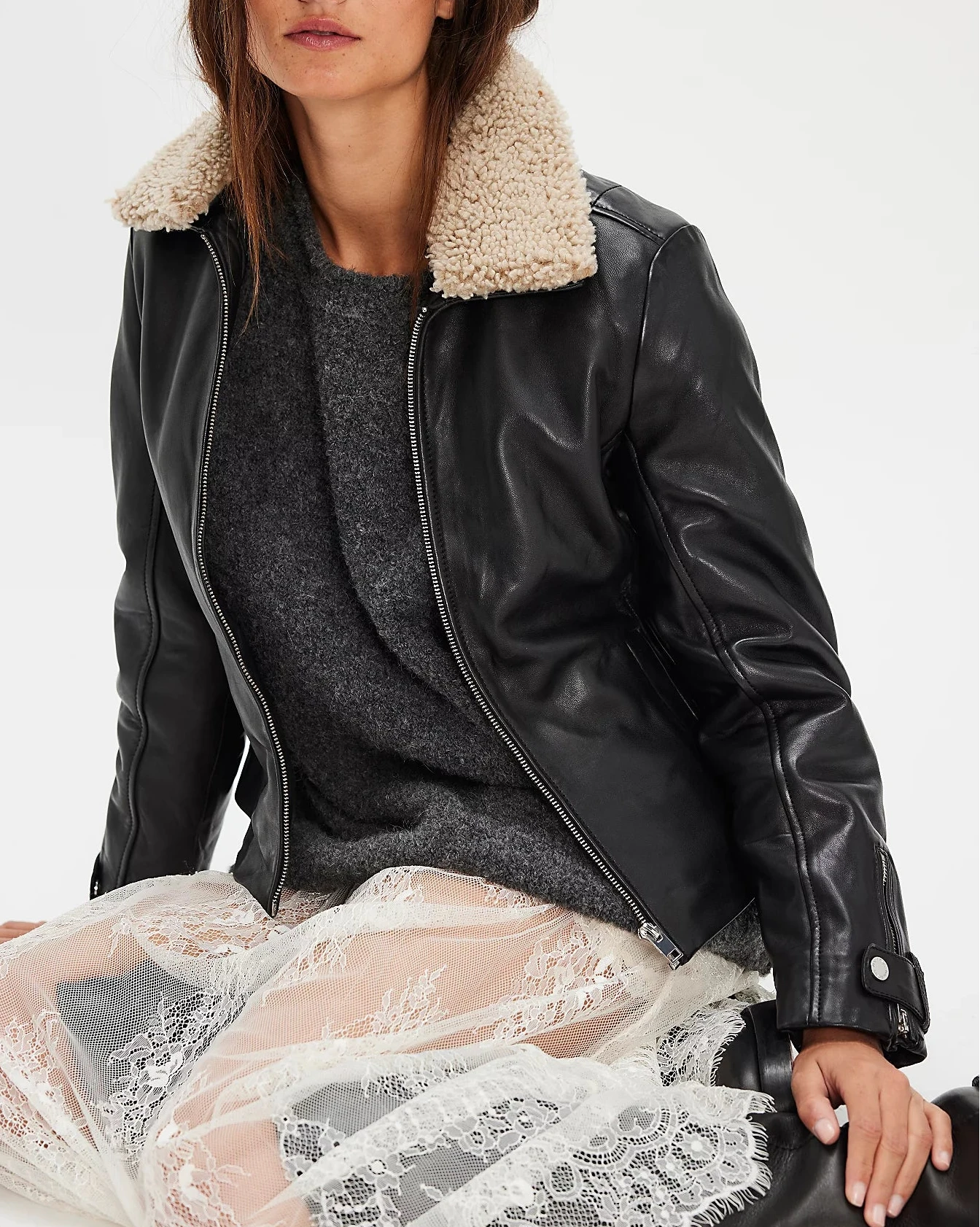 Tammy Cf black leather jacket with faux sherpa collar styled with lace skirt in Fredericksburg boutique