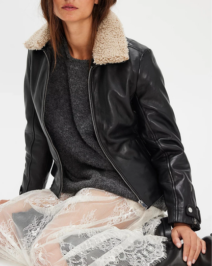 Tammy Cf black leather jacket with faux sherpa collar styled with lace skirt in Fredericksburg boutique