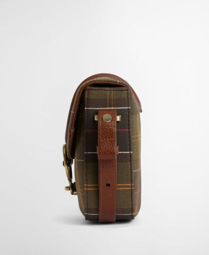 Elm Tartan Crossbody Bag side view showing plaid cotton canvas with leather strap and aged brass buckle