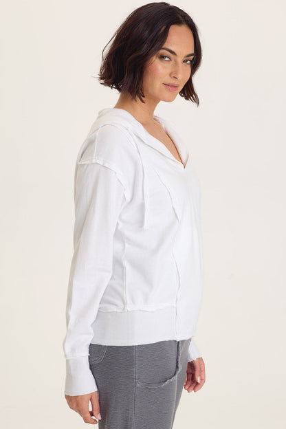 Rosalyn Hoodie in white with raw edges and slimming seams, from XCVI Women's Sweaters HCO