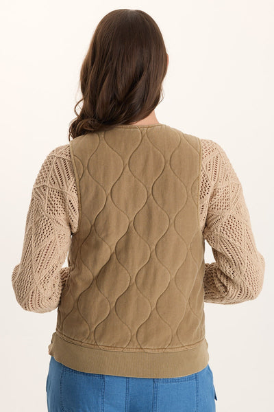 Aeric Quilted Vest in beige cotton quilting with wave pattern, styled with knit sleeves by XCVI