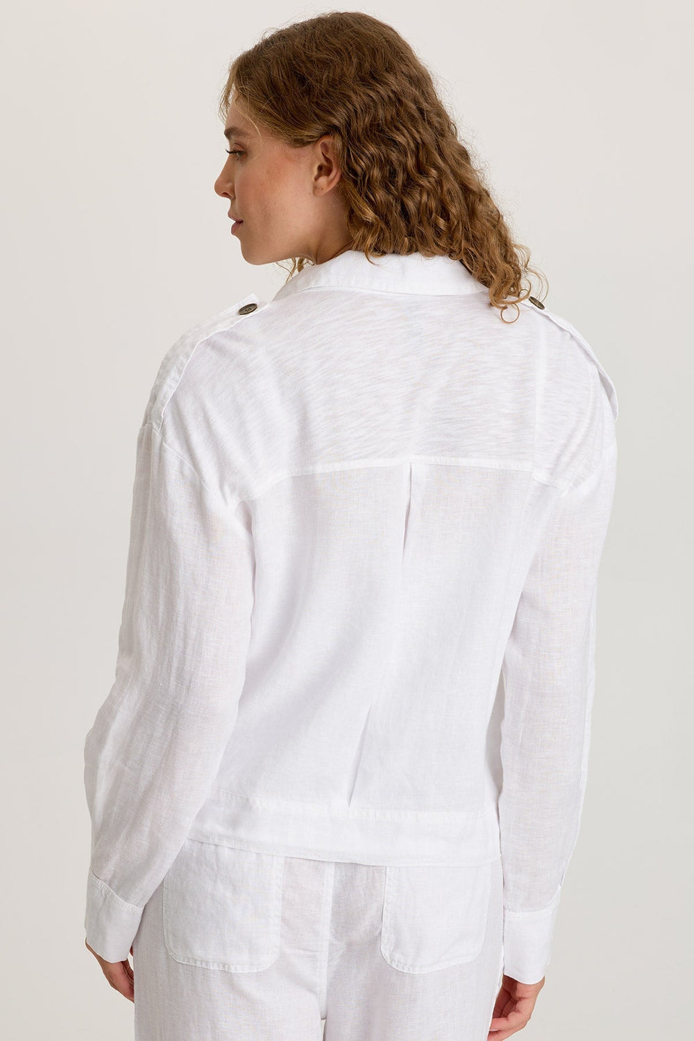 Baltazar Jacket in white linen with tabbed shoulders, brass buttons, and contrast back yoke XCVI