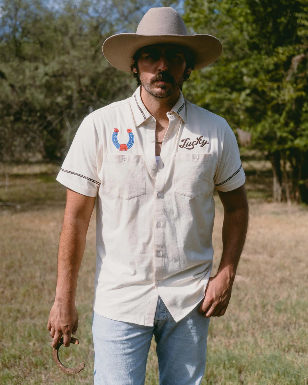 Drifter Shirt - Luck Is Earned beige white short sleeve with horseshoe and "Lucky" embroidery by TEXAS STANDARD