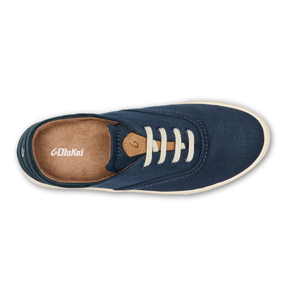 OLUKAI navy canvas sneaker with tan interior, white laces, cream sole
