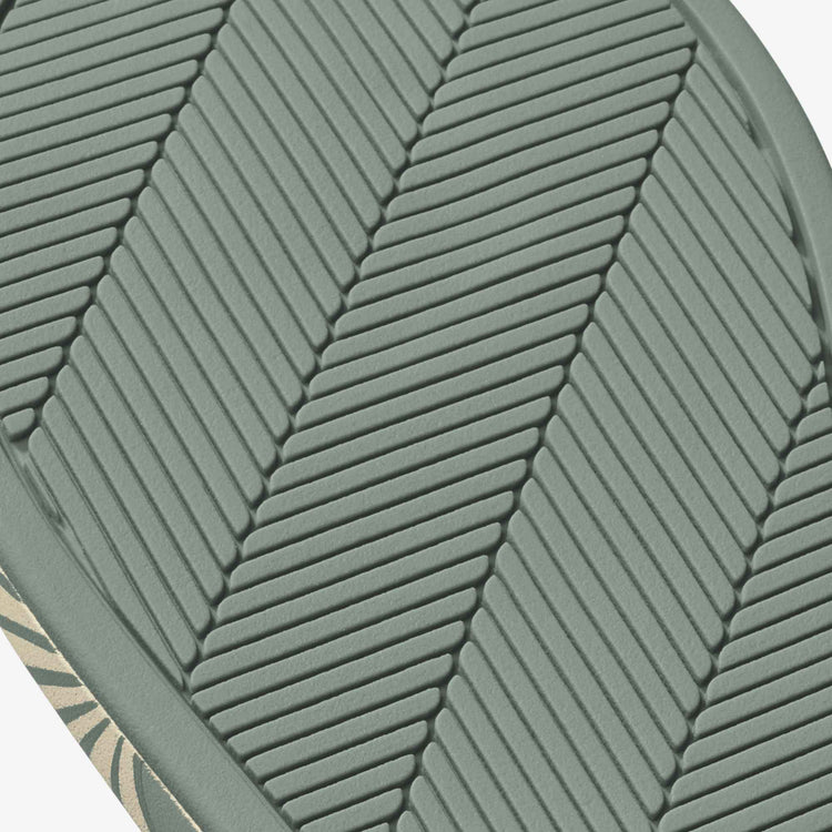 Close-up of green textured outsole tread for Uiki W flip-flops