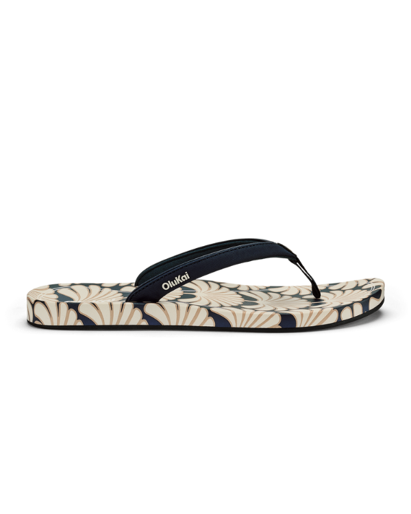 OLUKAI Uiki W flip-flops with green straps and leaf-pattern footbed