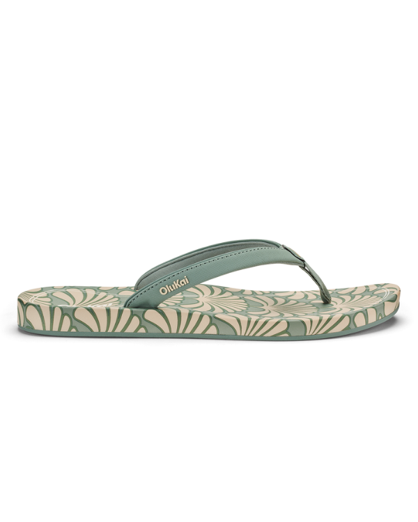 OLUKAI Uiki W flip-flops with green straps and leaf-pattern footbed