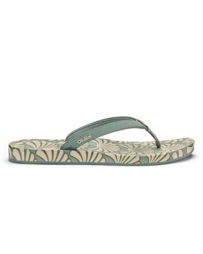 OLUKAI Uiki W flip-flops with green straps and leaf-pattern footbed