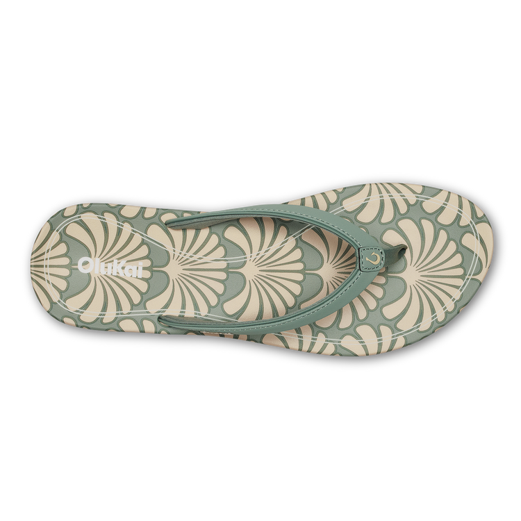 Leaf-print thong sandals with green ankle strap and cushioned footbed