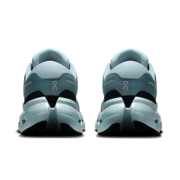 Two blue gray running shoes seen from behind