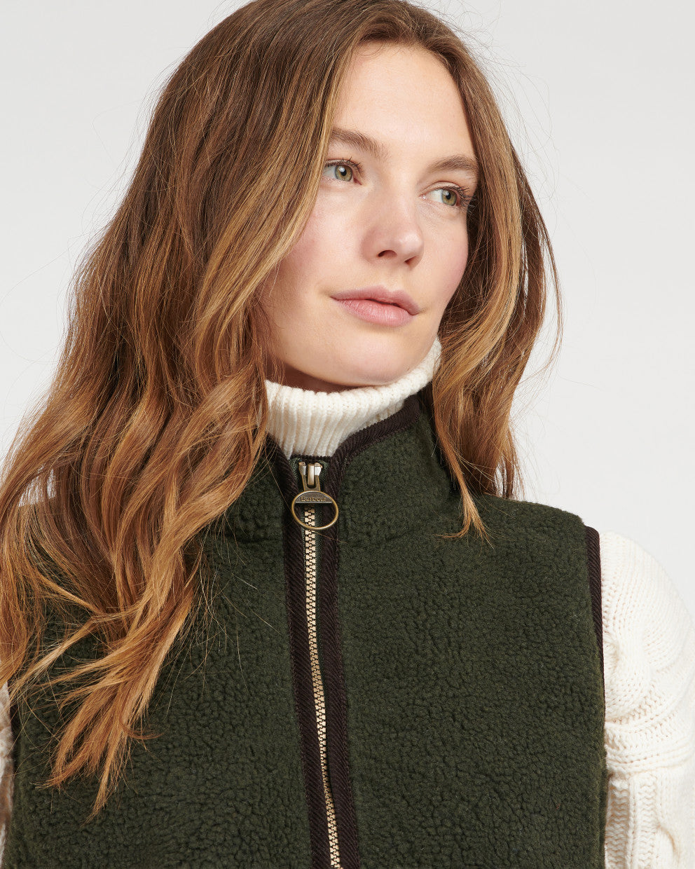 Burford Fleece sherpa vest in dark green with brown trim, cozy layering by BARBOUR INC.
