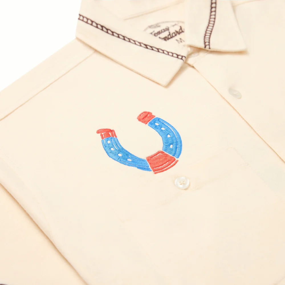 Drifter Shirt - Luck Is Earned beige short sleeve with blue and red horseshoe by TEXAS STANDARD
