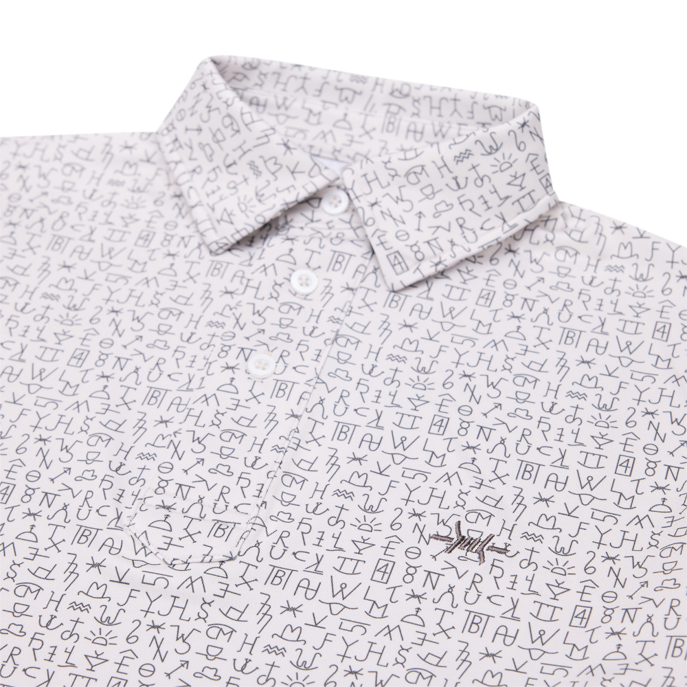 Traditional polo in ash, close-up of button placket and patterned fabric