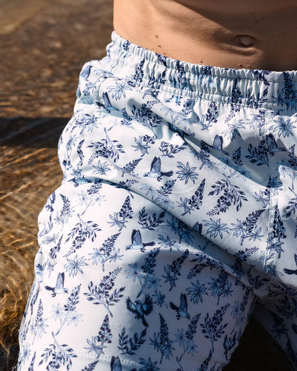 Waterloo Swim Shorts - Bluebonnet 7 in white with blue floral and bird print by TEXAS STANDARD