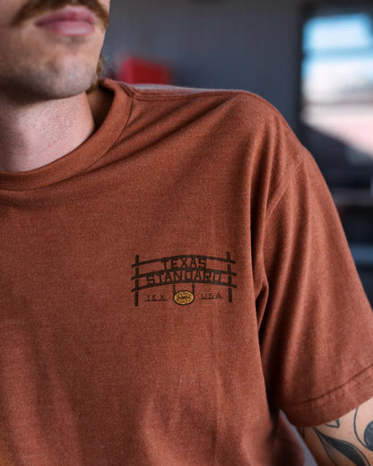 Heritage Printed Tee - Homestead in brown with vintage Texas fence design by TEXAS STANDARD