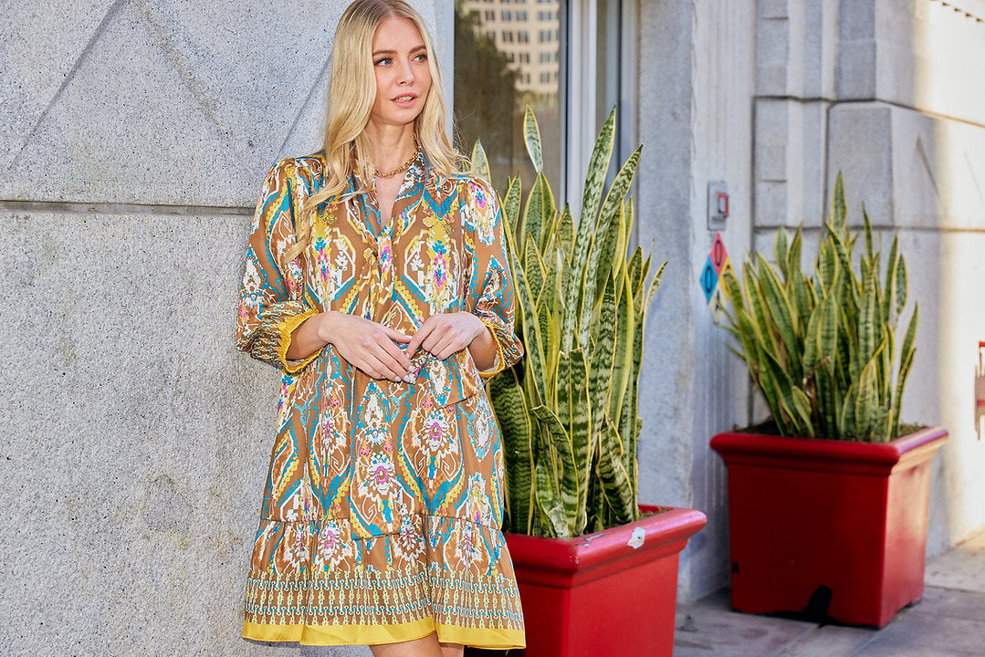 The Flounced Dress with multicolor geometric floral pattern in poly twill by JOY JOY at HCO