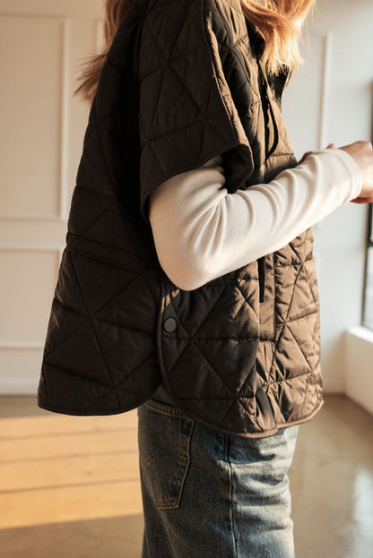 Jamel Puffer Jacket (BLACK) side close-up with quilting and snap button pocket tab