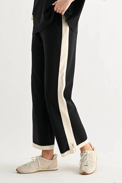 Kristopher Pant - Black by JOH APPAREL, wide-leg black pants with cream side stripes