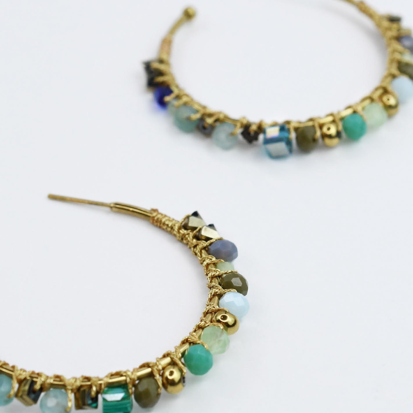 Sea Glass Hoops with aqua, emerald, and blue beads wrapped in gold, Treasure Jewels curated