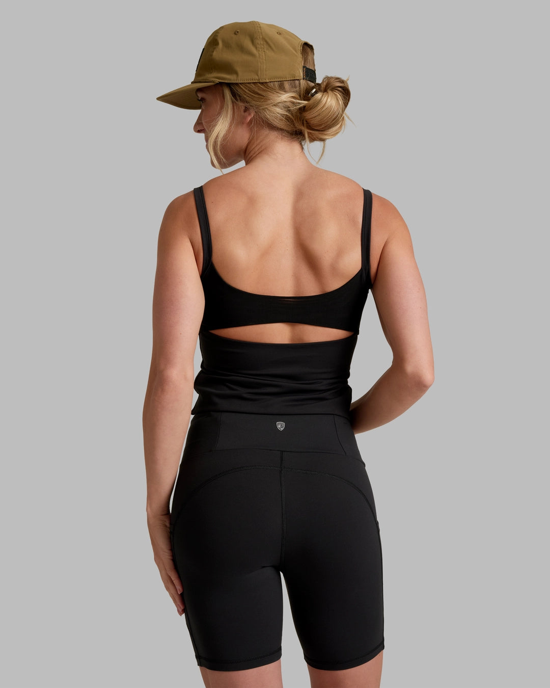 Kush Bra Tank - Black with breathable mesh back, moisture-wicking stretch fabric, KUHL activewear