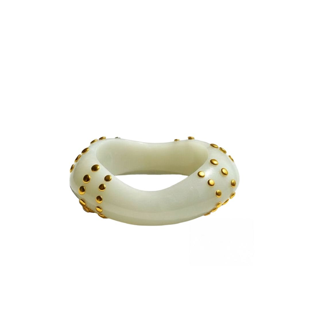 Bondi Bangle in ivory resin with gold-plated stainless steel studding by ACCESSORY CONCIERGE