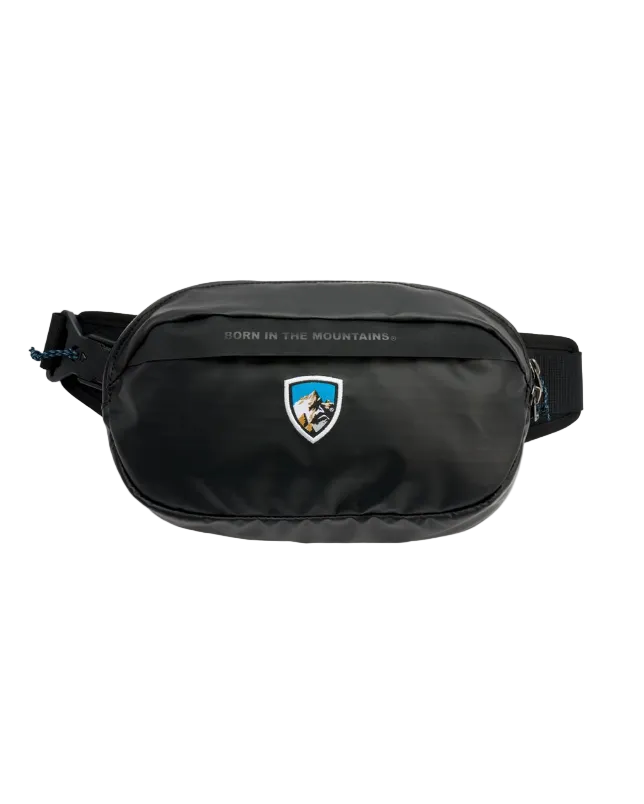 Eskape Sling Pack - Pirate Black with mountain emblem, durable nylon, KUHL Bags collection