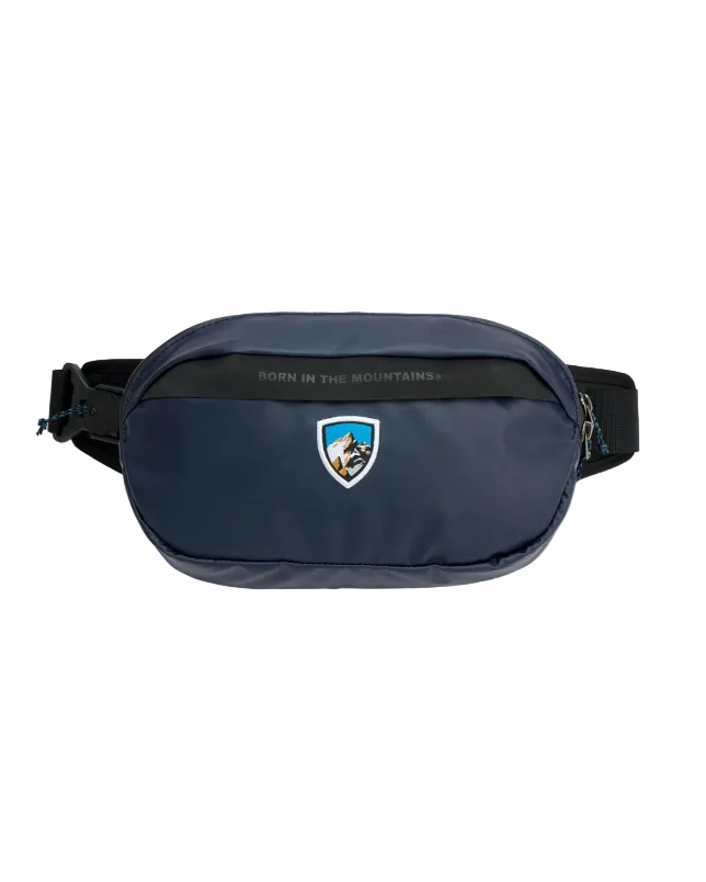 Eskape Sling Pack - Pirate Blue with mountain emblem, durable nylon, KUHL Bags and Active collection