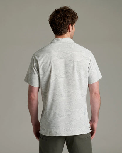 Persuadr Polo in light gray with subtle wave design, quick-dry, stretch, moisture-wicking by KUHL