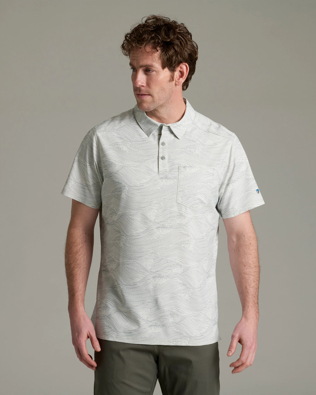 Persuadr Polo in light gray with subtle wave pattern, quick-dry, stretch, and UV protection by KUHL