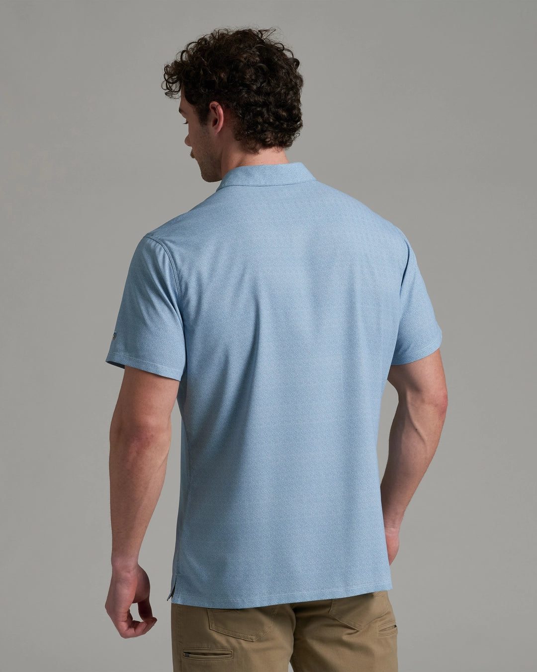 Persuadr Polo in soft blue with stretch, moisture-wicking, quick-dry, and UV protection by KUHL