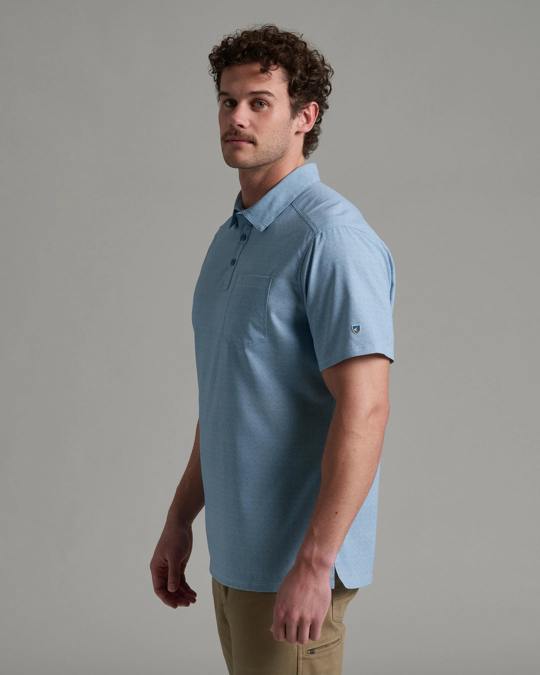 Persuadr Polo in soft blue with stretch, moisture-wicking, quick-dry, and UV protection by KUHL