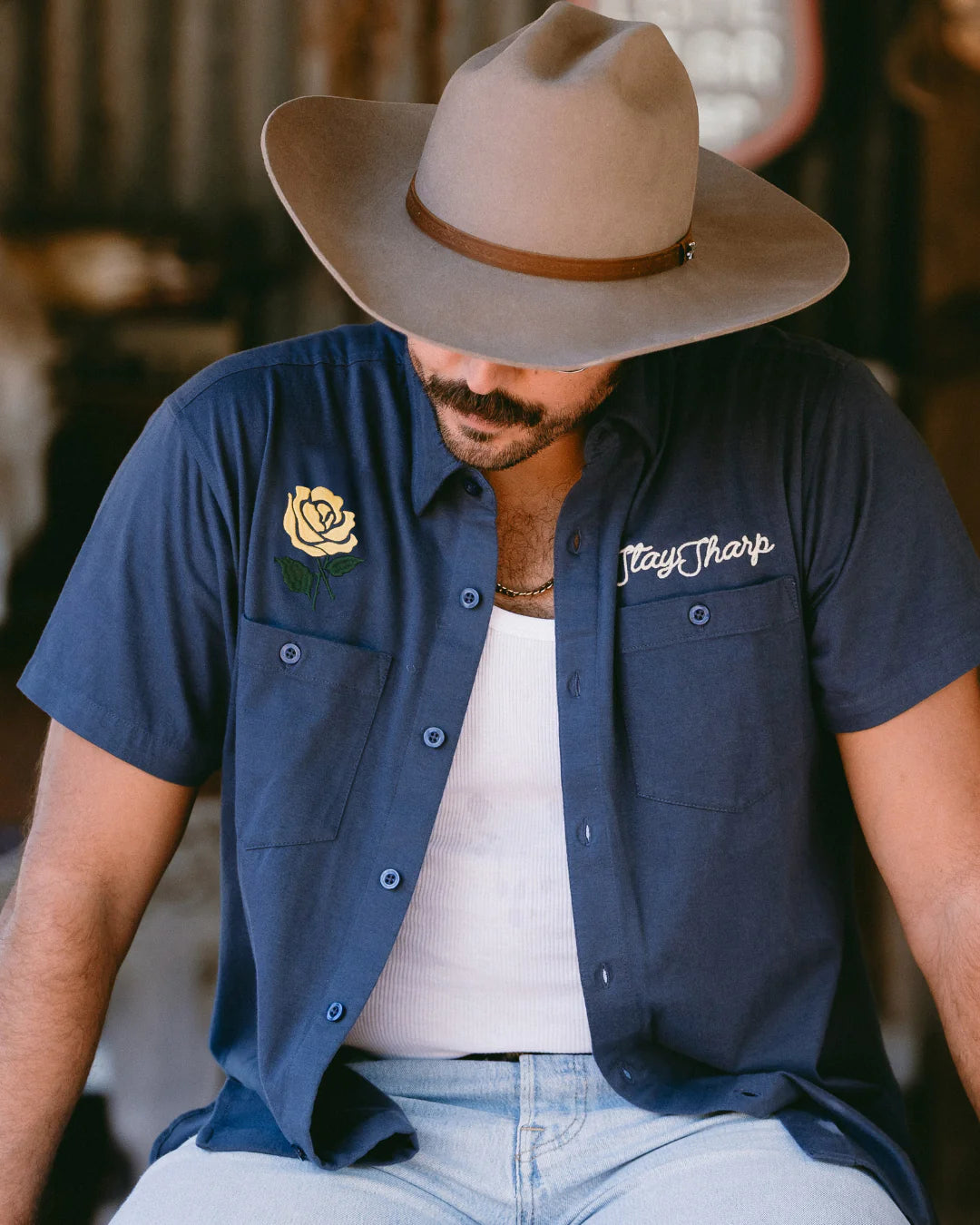 Drifter Shirt - Yellow Rose navy short sleeve with yellow rose and "Stay Sharp" embroidery by TEXAS STANDARD