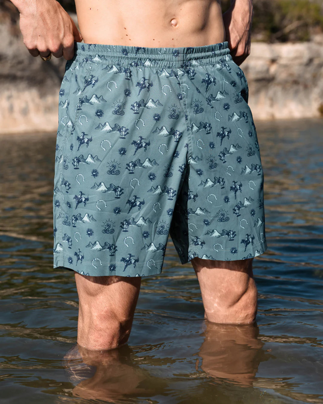 Waterloo Swim Shorts - Badlands Academy 7" in muted blue with geometric animal print by TEXAS STANDARD