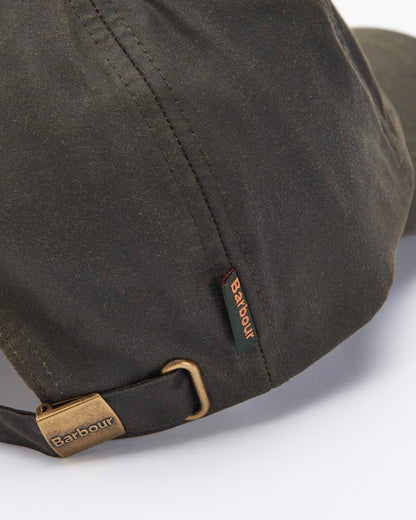 Wax Cap in olive waxed cotton with adjustable strap and Barbour branding, curated Fredericksburg TX