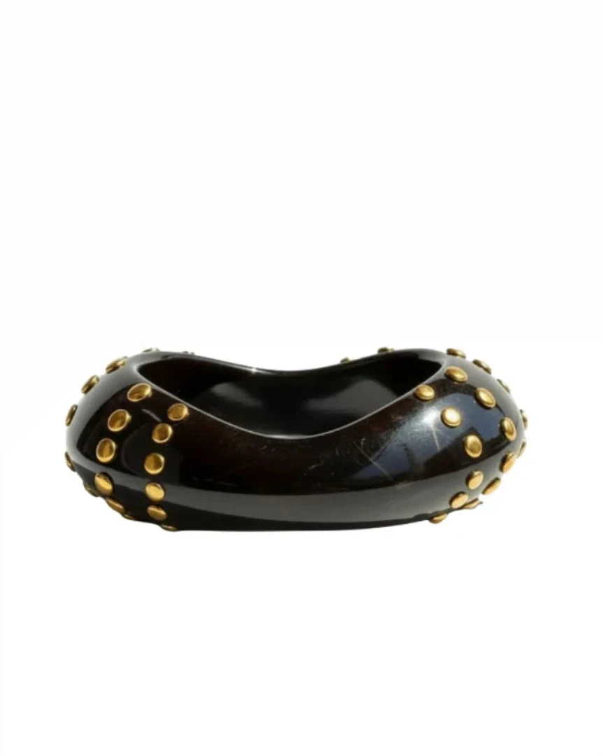 Bondi Bangle in black resin with gold-plated stainless steel studs by ACCESSORY CONCIERGE