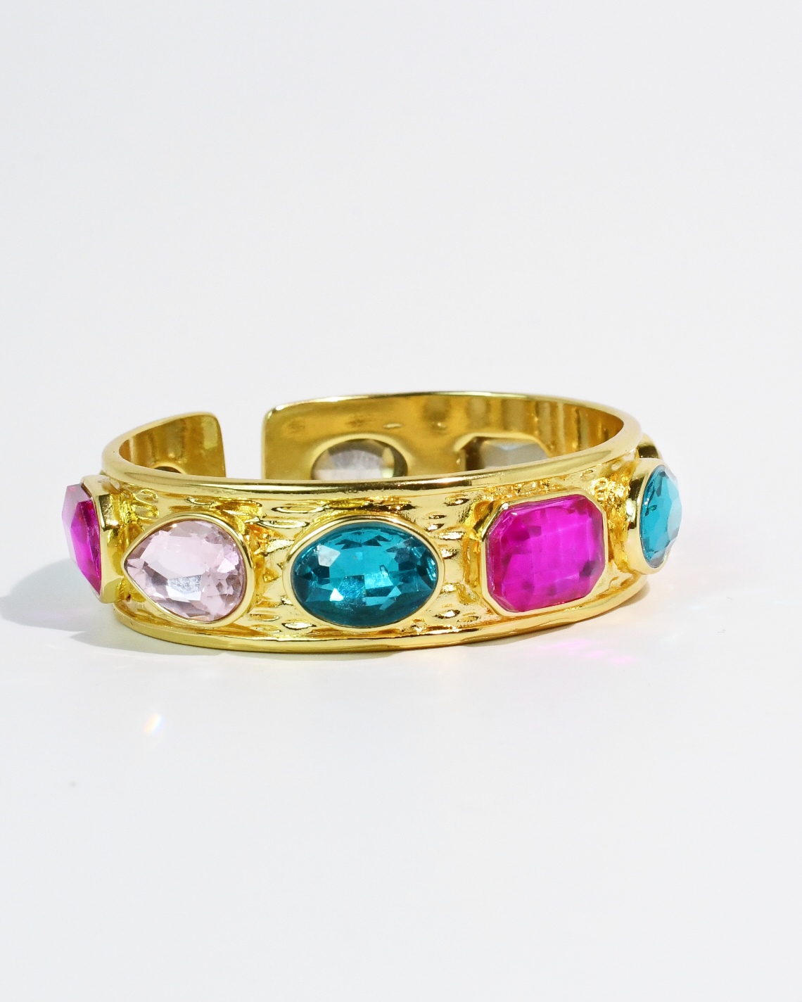 Multi Glow Bangle with gold cuff and vibrant pink, blue, and clear gemstones by TREASURE JEWELS